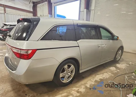 2012 Honda Odyssey Touring z USA, uszkodzony, nr VIN 5FNRL5H92CB101576